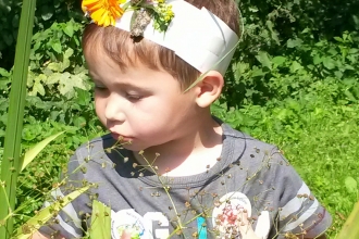 boy enjoying nature at Severn Farm Pond Nature Reserve copyright MWT