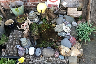 Phil Stallard's pond with added items from beach cleans! copyright Ceri Jones