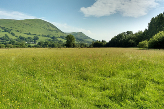 Beautiful nature reserve with green hills in the background