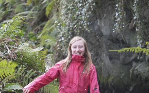 Molly stands in a stream