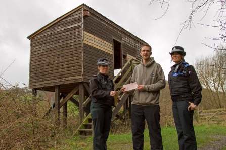 Dyfed Powys Police present cheque for Pwll Penarth to MWT's Rob Haigh copyright MWT