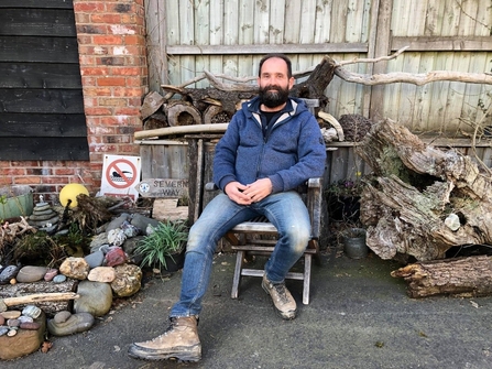 Phil Stallard relaxing in his wildlife garden copyright Ceri Jones