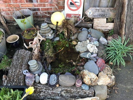 Phil Stallard's pond with added items from beach cleans! copyright Ceri Jones