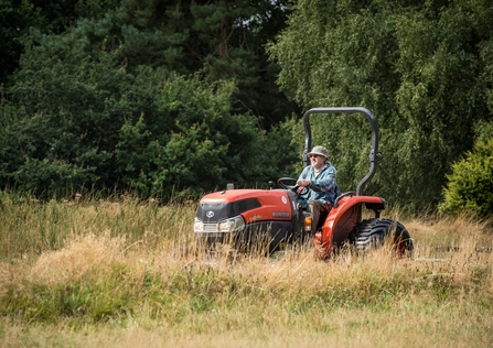 Tractor cutting field; Photo: © Matthew Roberts