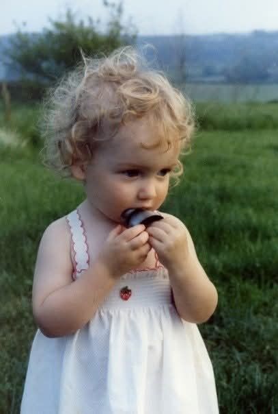 Close-up of a little girl in a sun-dress