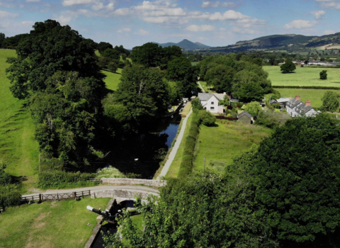 Aerial shot of the Montgomery Canal near Belan Locks in summer